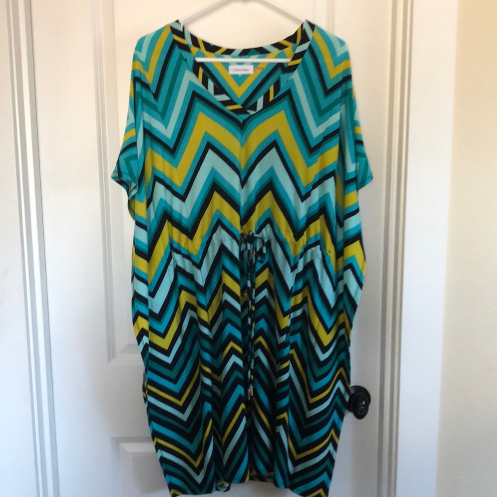 Calvin Klein dress with cinch waist tie. Polyester and spandex. Size 14